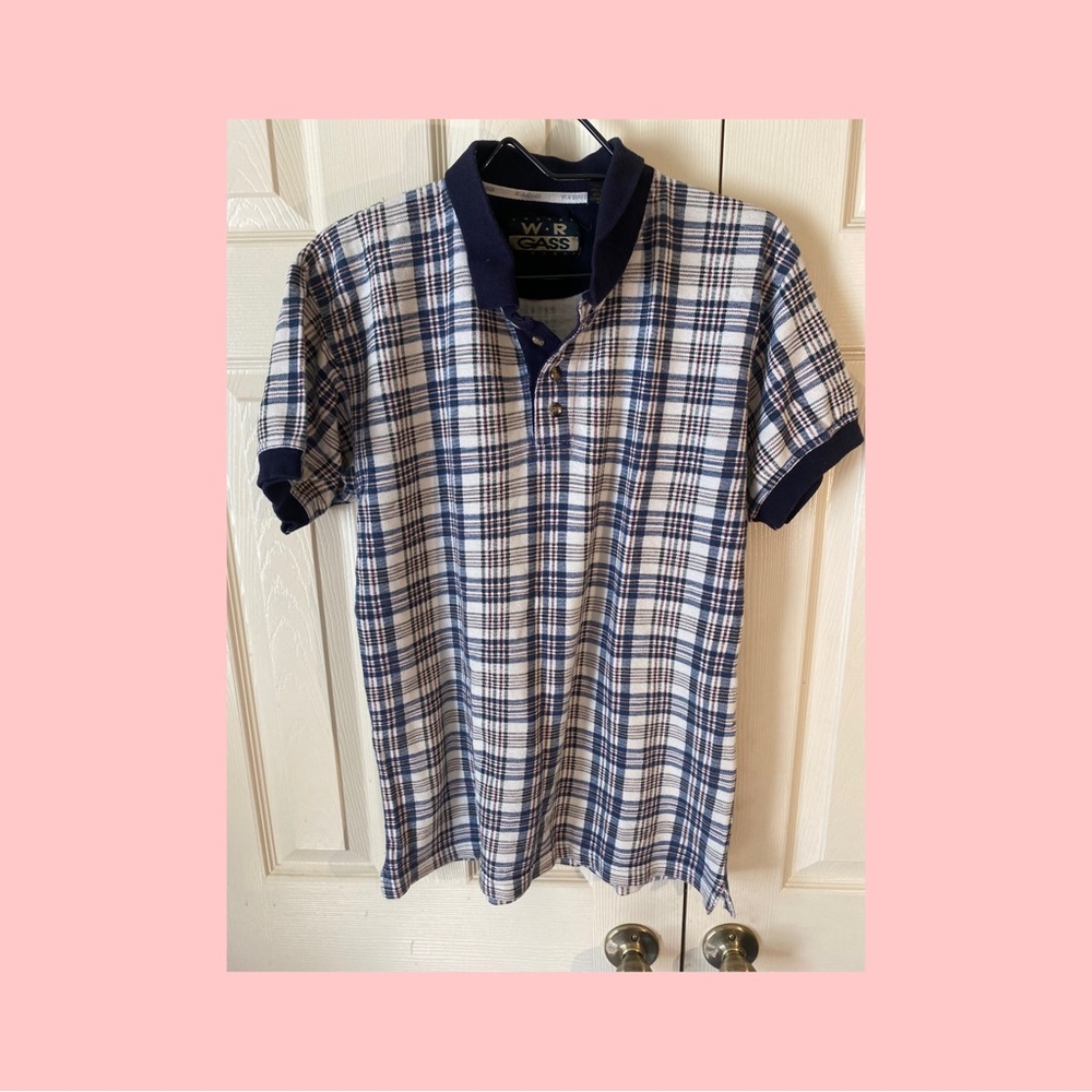Used light brown plaid shirt sleeve shirt. Shirt is altered .